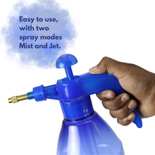 Load image into Gallery viewer, Hand holding a blue spray bottle on a white background