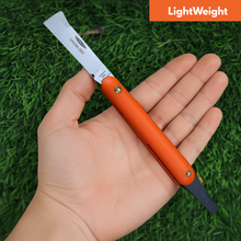 Load image into Gallery viewer, Orange garden tool held in a hand with grass background, 'LightWeight' label visible