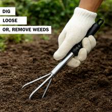 Load image into Gallery viewer, Hand wearing a white glove holding a garden cultivator in soil with text 'DIG LOOSE OR, REMOVE WEEDS'.