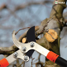 Load image into Gallery viewer, Gardening shears cutting a branch with a blurred natural background