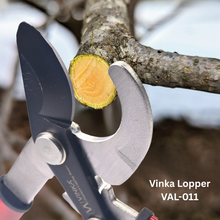 Load image into Gallery viewer, Vinka Lopper pruning shear cutting a branch with a blurred background
