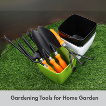 Load image into Gallery viewer, Set of gardening tools including shovels, trowels, and a fork in a green holder on grass.
