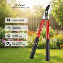 Load image into Gallery viewer, Gardening shears with Vinka branding and features on a garden background
