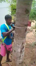 Load and play video in Gallery viewer, Vinka Coconut Palm Tree Climber Machine| Coconut Tree Climbing Plucking Machine | Standing Rod Coconut Palm Tree Manual Climber | 	Item Code: VACC-001 | Safe and Easy
